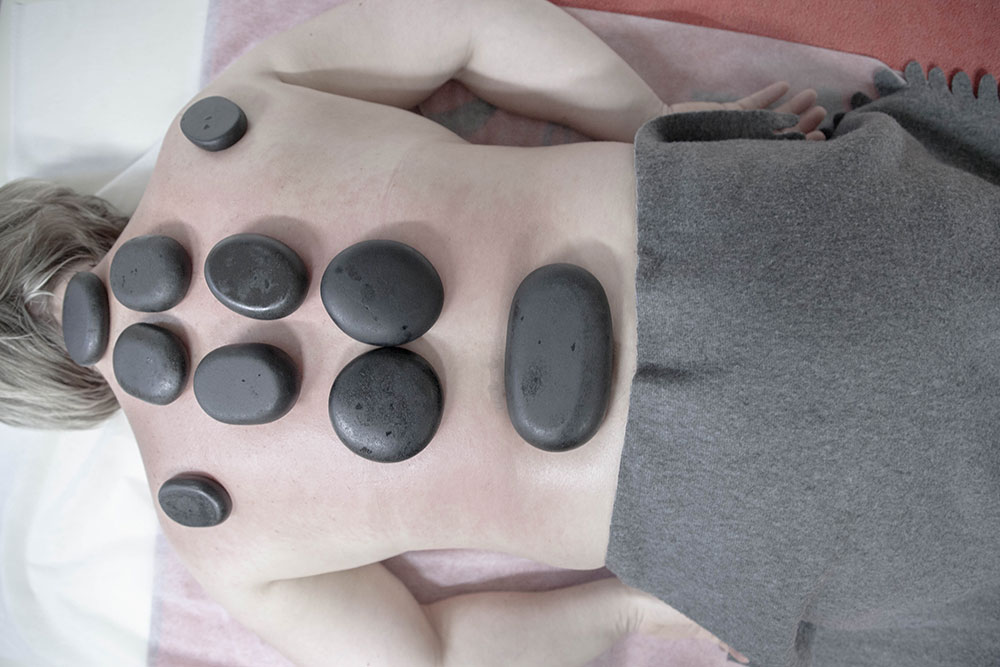 Hausarzt Arnsberg - Stoll - Leistungen - Hot Stone Massage